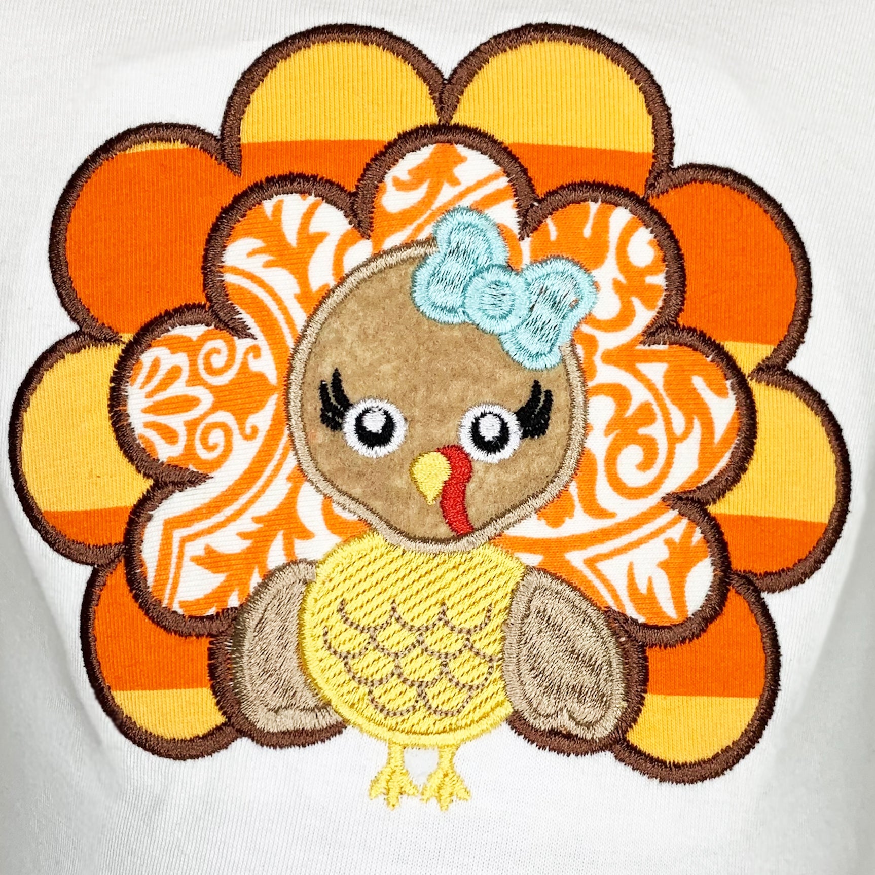 AnnLoren Big Little Girls Autumn Turkey Tunic & Leggings featuring a turkey applique, cream tunic, and orange knit leggings.